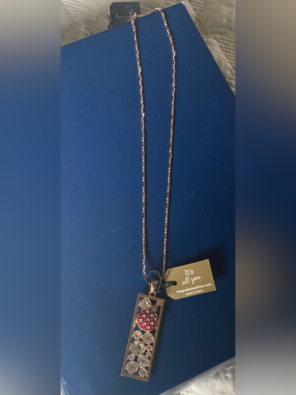 Gold-tone Pendant Necklace with Red and Clear Stone snap